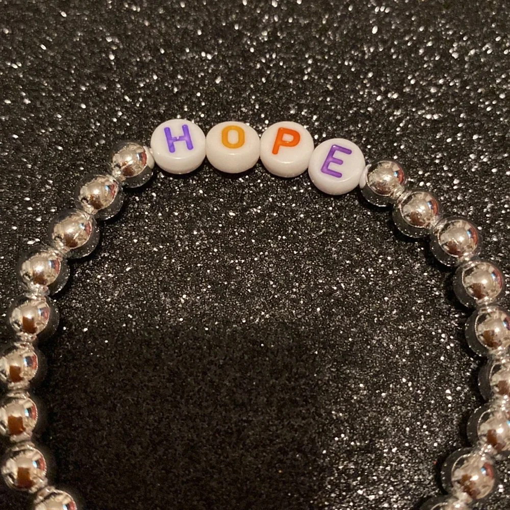 Girls faux silver bead hope stretch bracelet